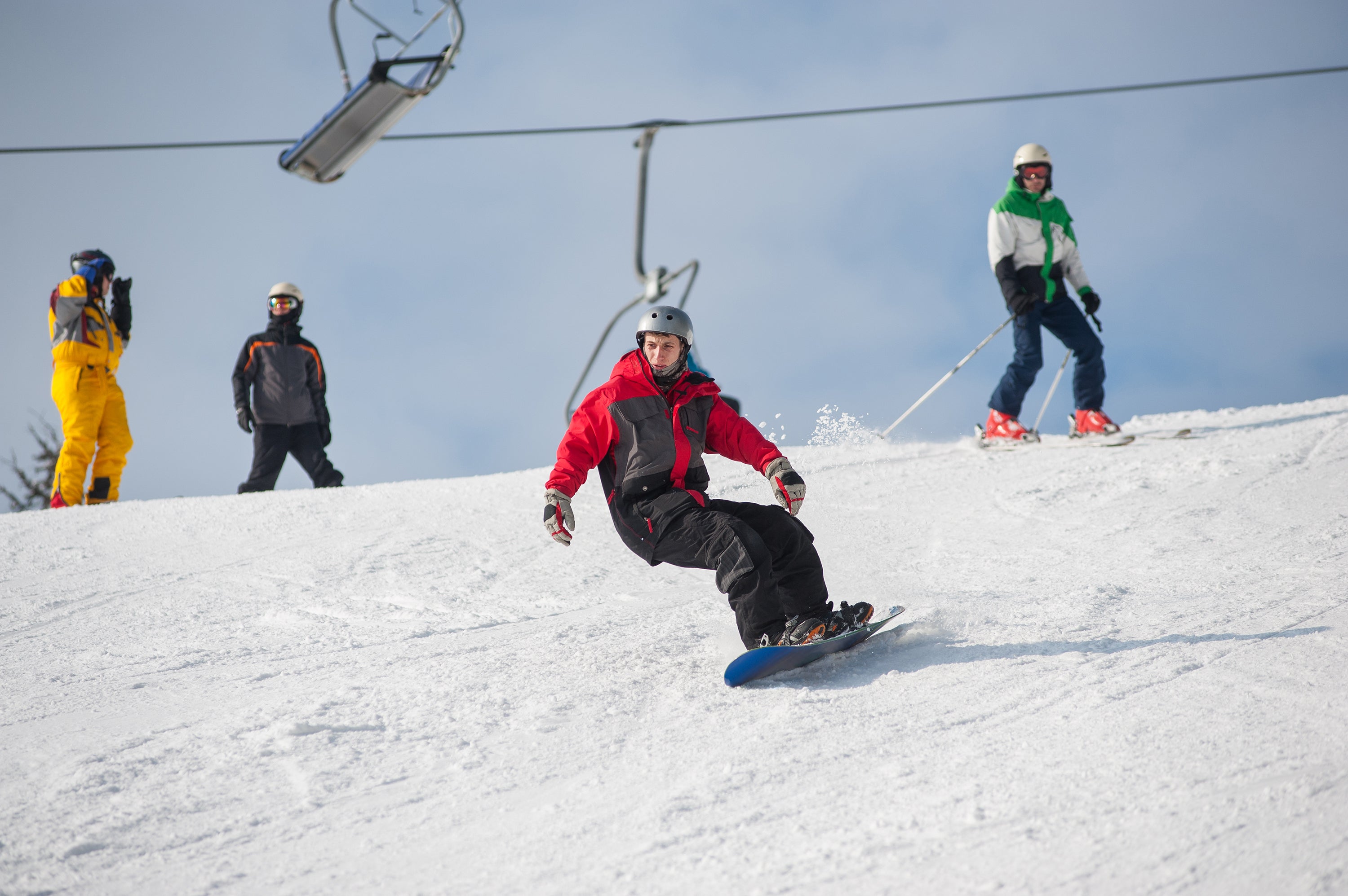 male-snowboarder-riding-down-from-the-mountain-in-2023-11-27-05-05-14-utc.jpg