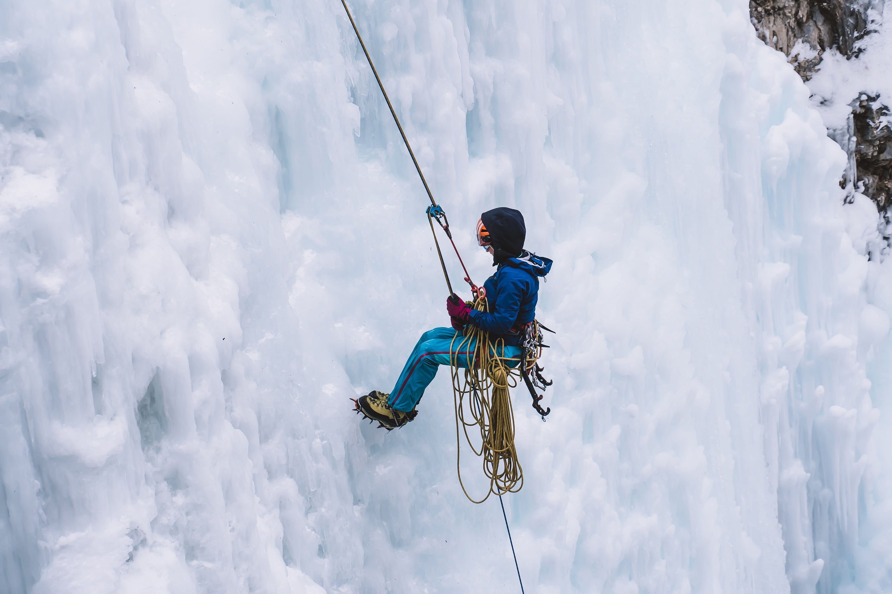 person-abseiling-on-a-large-frozen-waterfall-with-2023-11-27-05-13-35-utc.jpg